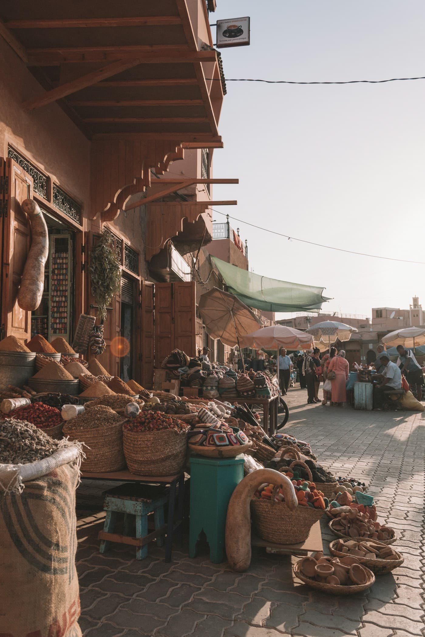 Colourful African open-air market with goods out waiting for buyers